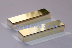 gold plated tungsten paperweight